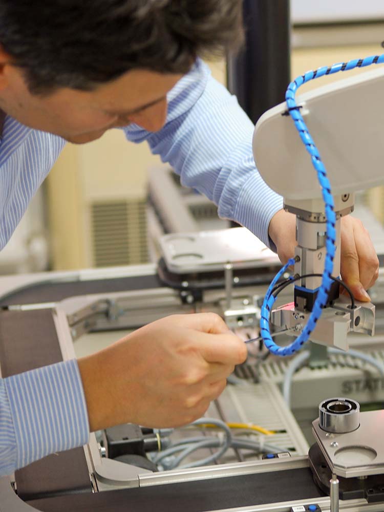 Repariman working on equipment.